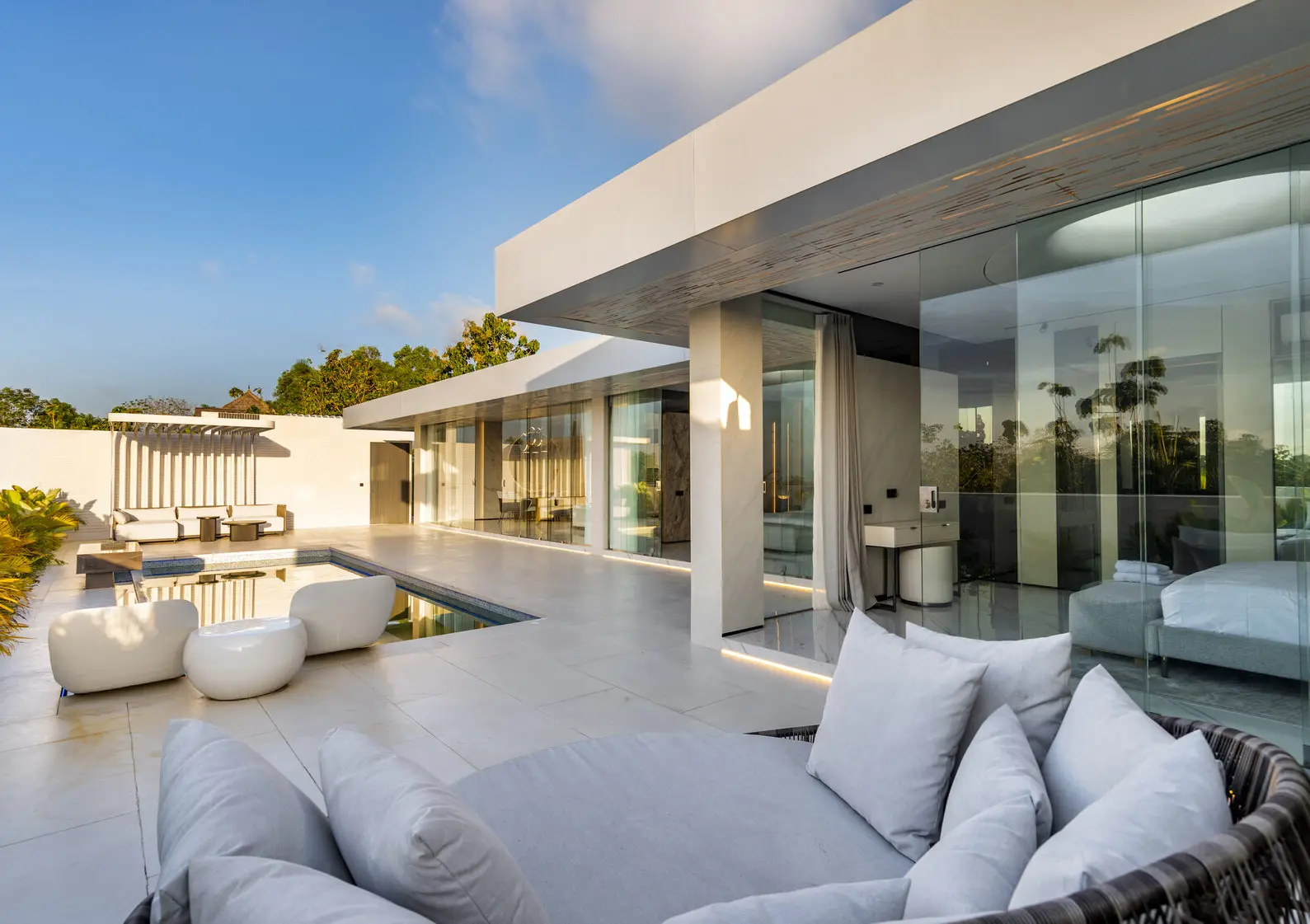 Pool terrace of the two-bedroom villa at sunset — 2