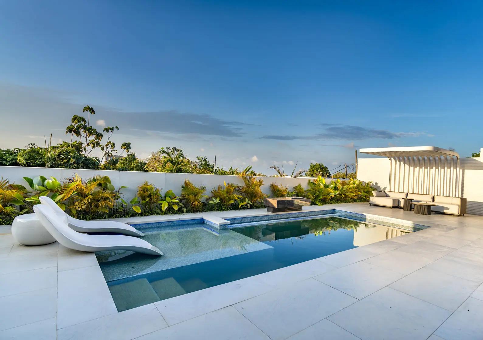 Pool terrace of the two-bedroom villa at sunset — 3